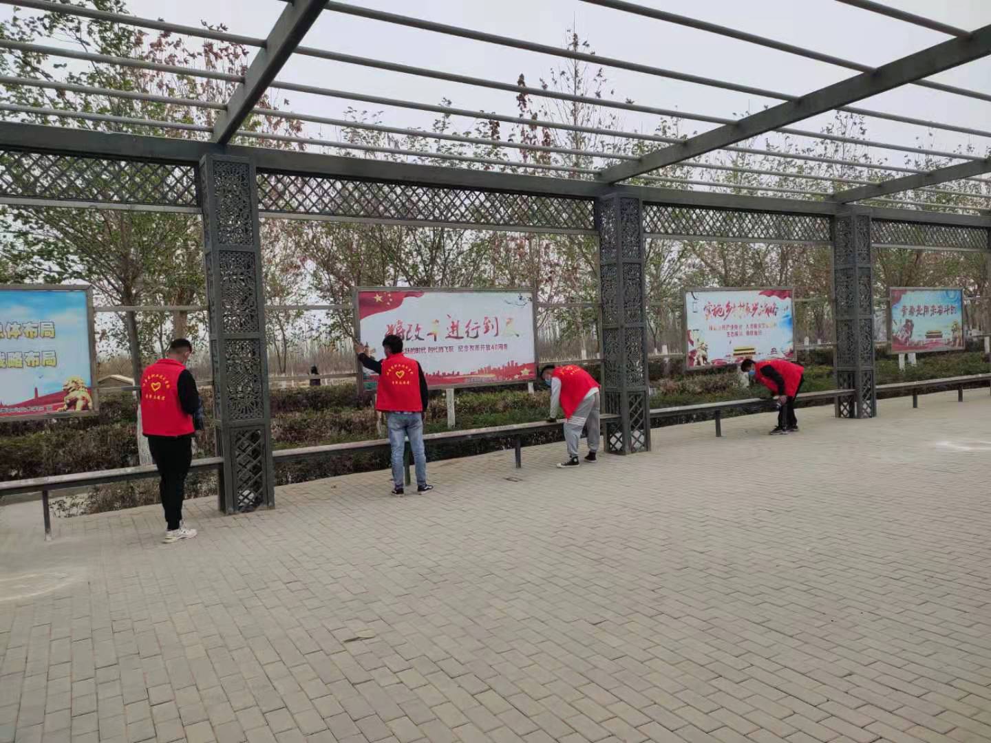 国际足联世界杯团委开展“清洁校园 美化环境”志愿服务活动(图片新闻)